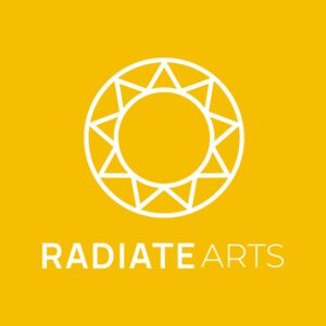 Radiate Arts logo in white, featuring a circular sun-like shape made of triangular rays arranged around a hollow centre. The words “Radiate Arts” are written below the symbol in bold white text on a bright yellow background.